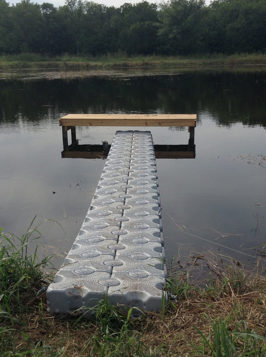Floating fishing dock on a fishery pond